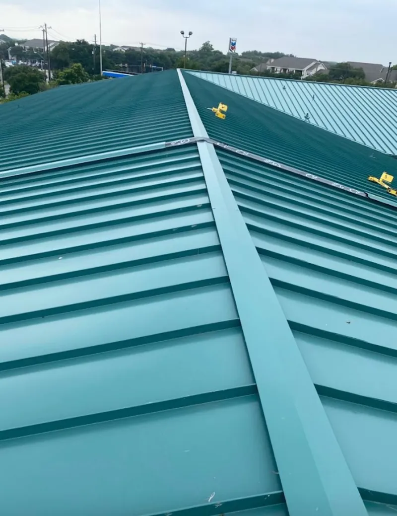 Green commercial metal roof ridge and valley for Metal Roof Repair in Hopedale