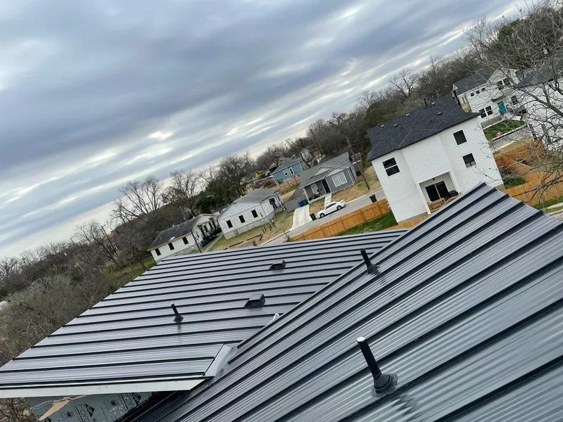 Standing seam metal roof panels with vents for Skylight Repair in Hopedale